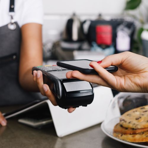 Customer paying with contactless payment